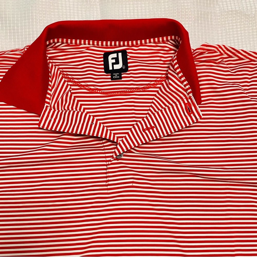 Brand new never worn Foot Joy polo golf shirt